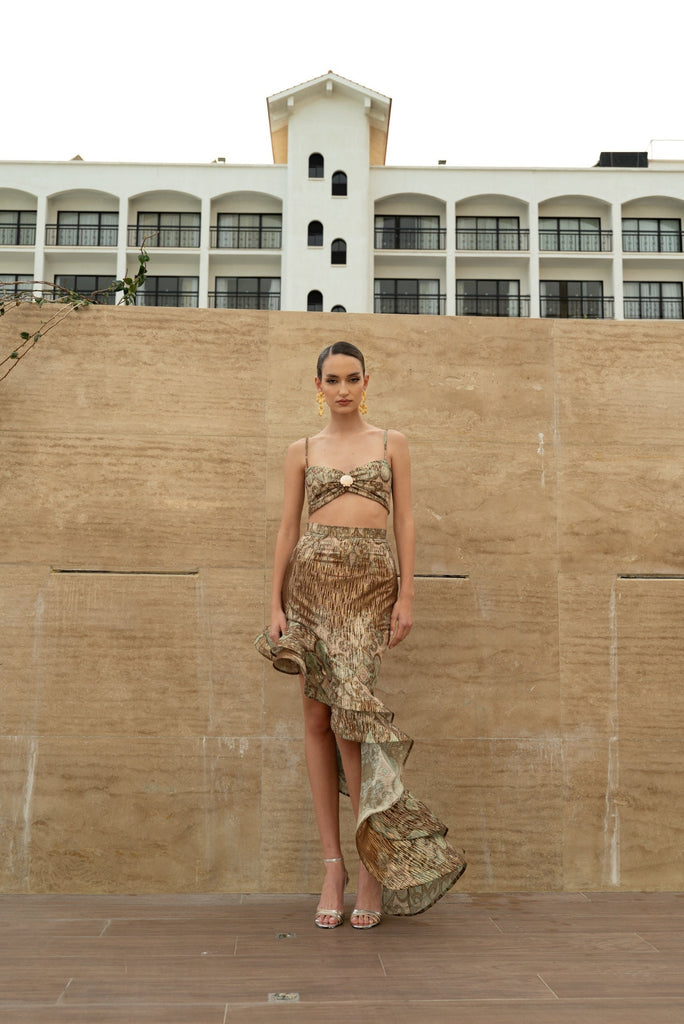 Joanna Economou Designs, @joannaeconomoudesign Cyprus-based fashion designer resort and luxury wear occasion two-piece multicoloured beige ensemble featuring a top with shell-inspired accent and a draped, asymmetrical ruffled skirt, elegant designer piece for women island Mediterranean-inspired. Shop online from Cyprus worldwide shipping.